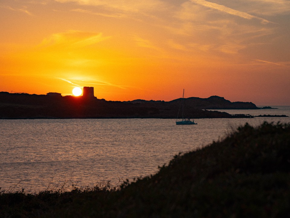 Tramonto sulla Torre Spagnola di Isola Rossa